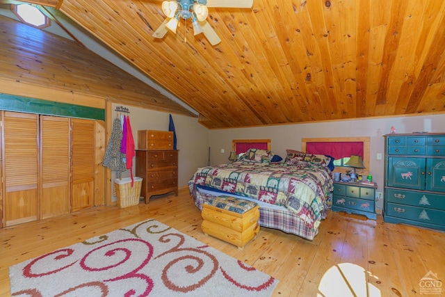 bedroom featuring hardwood / wood-style floors, vaulted ceiling, ceiling fan, and wooden ceiling