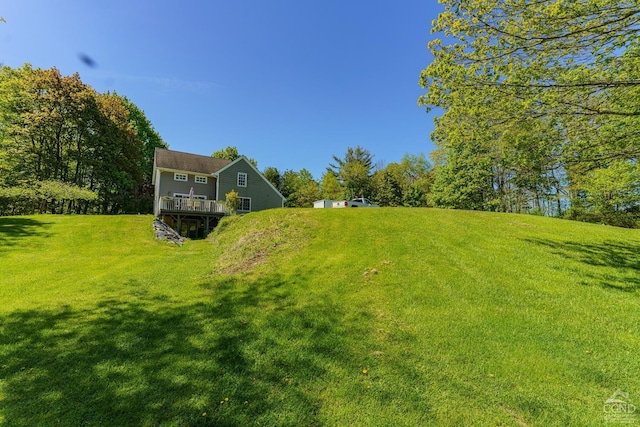 view of yard featuring a deck