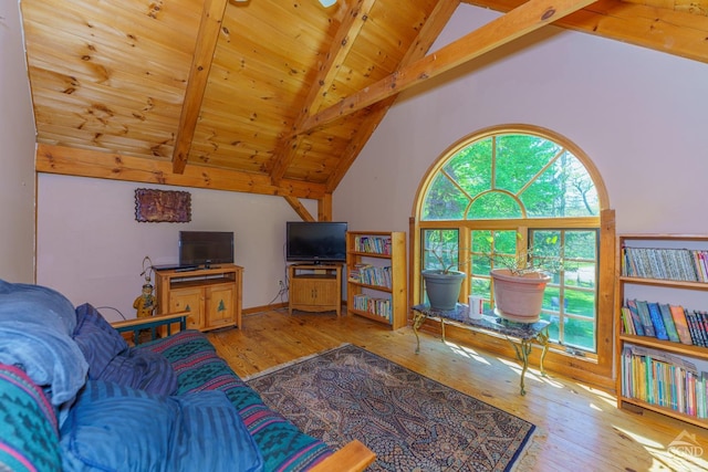 living room with light wood-type flooring, lofted ceiling with beams, and wood ceiling