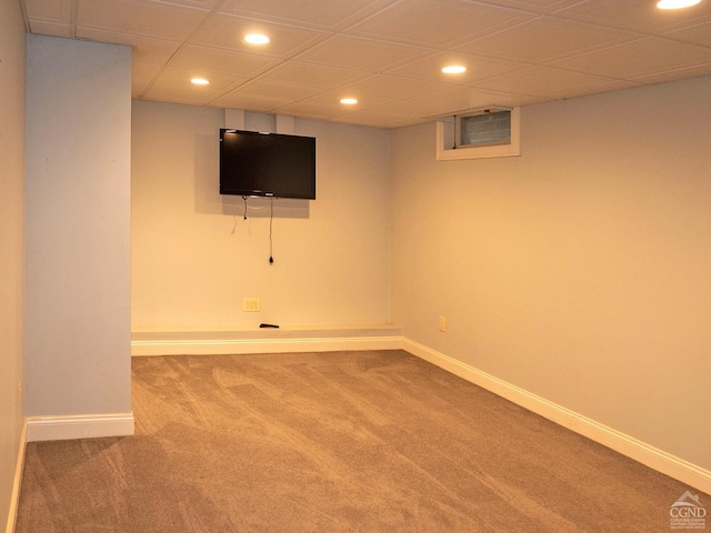 basement with carpet flooring