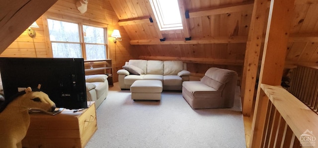 living area featuring carpet floors, wooden walls, and lofted ceiling with skylight