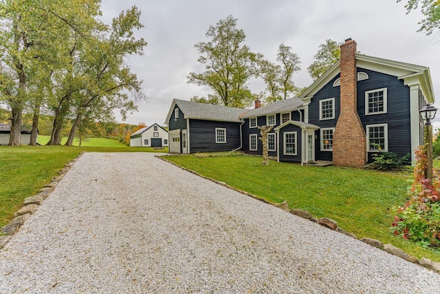 view of front of home with a front lawn