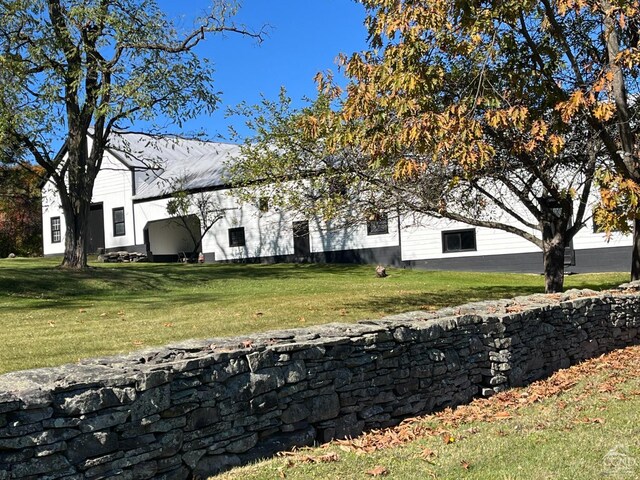 exterior space with a lawn