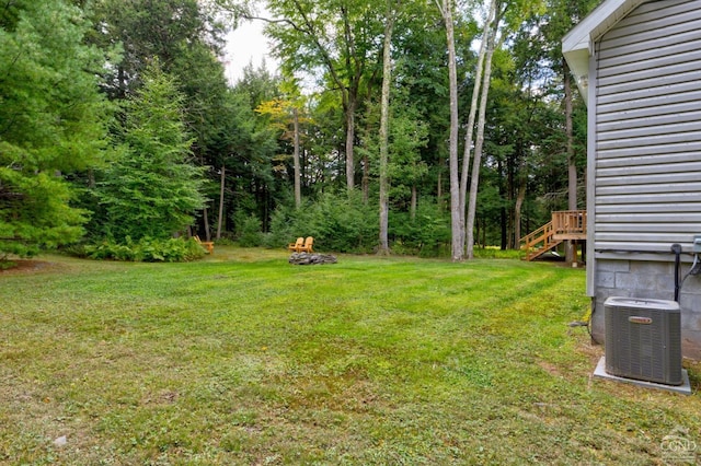 view of yard with central AC unit