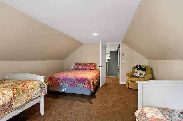 carpeted bedroom with vaulted ceiling