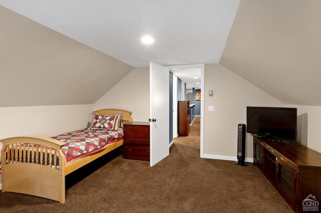 carpeted bedroom featuring vaulted ceiling