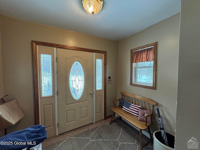 foyer featuring tile patterned flooring