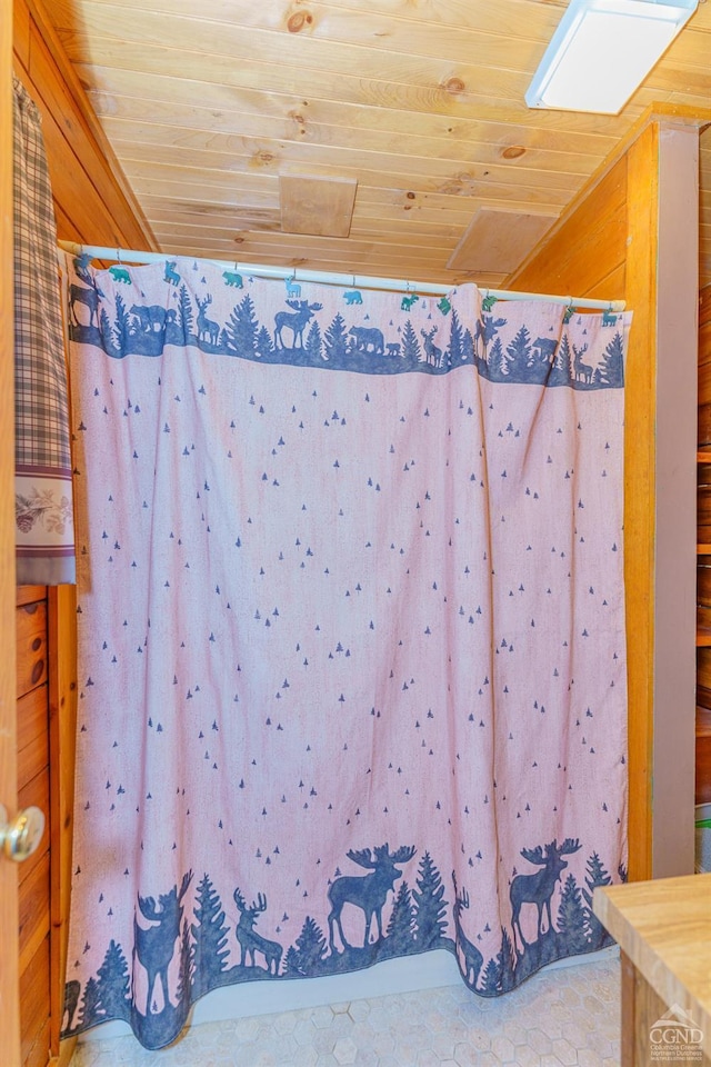 bathroom featuring wooden ceiling