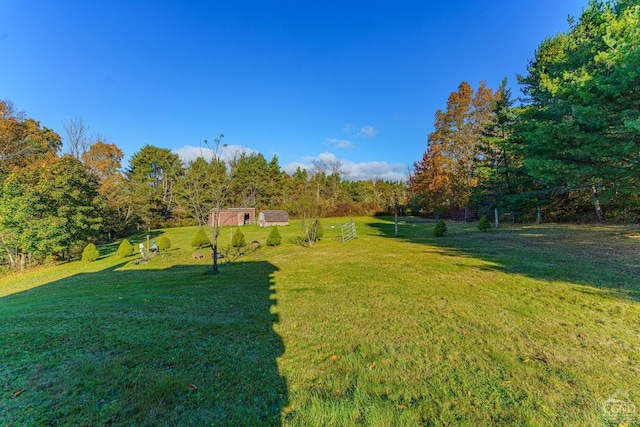 back of property featuring a lawn