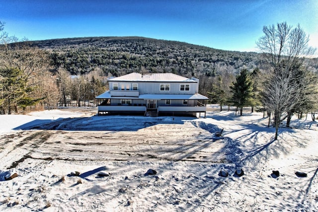 exterior space featuring a mountain view