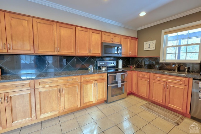 kitchen featuring decorative backsplash, sink, stainless steel appliances, and ornamental molding