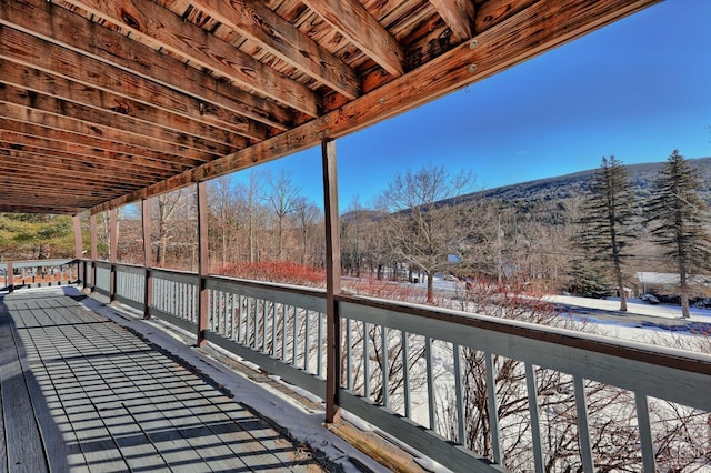 view of snow covered deck