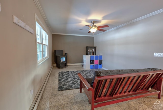 bedroom featuring ceiling fan, a wood stove, crown molding, and baseboard heating