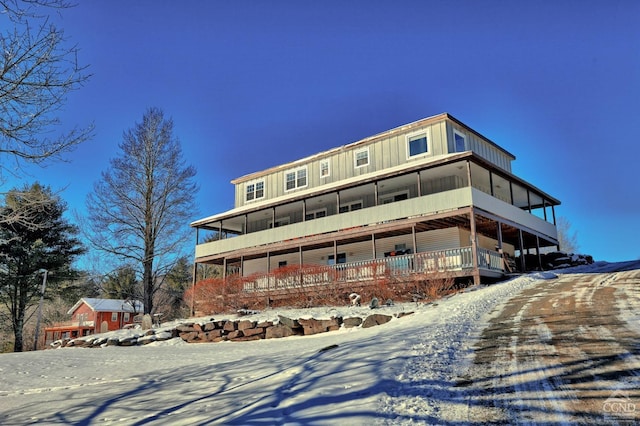 view of snow covered property