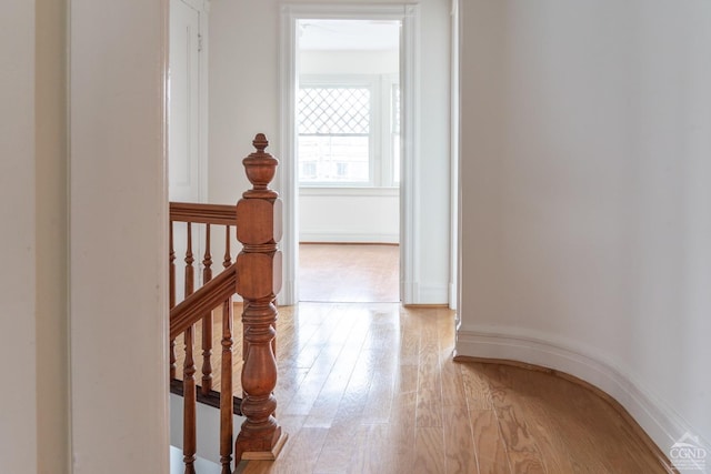 corridor with light wood-type flooring