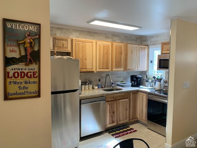 kitchen with sink, light brown cabinets, tasteful backsplash, appliances with stainless steel finishes, and ornamental molding