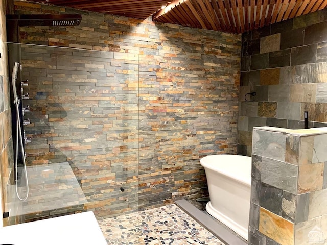 bathroom with wooden ceiling and plus walk in shower