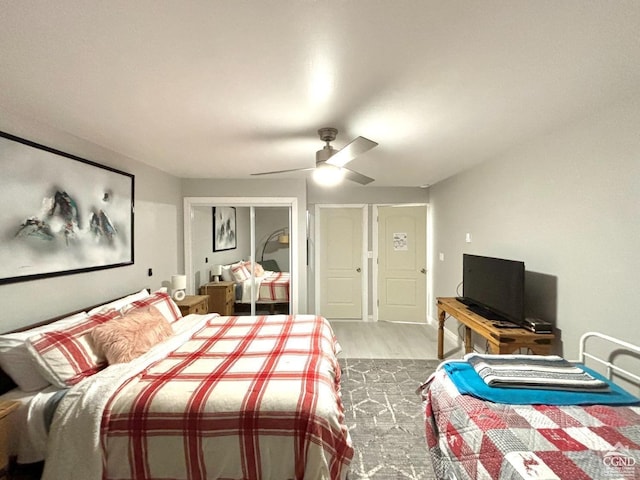 bedroom featuring ceiling fan and hardwood / wood-style floors