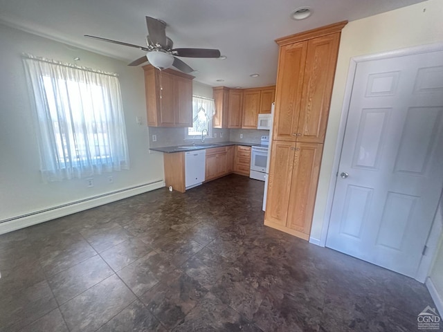 kitchen featuring a baseboard heating unit, decorative backsplash, white appliances, a ceiling fan, and a sink