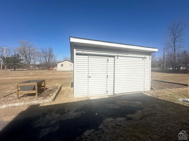 garage with a storage shed