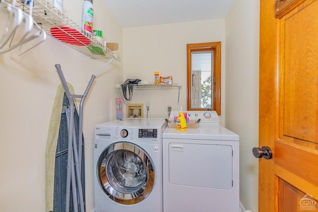 laundry area featuring washing machine and dryer