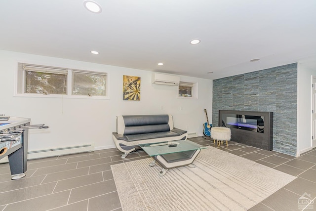 tiled living room with a tiled fireplace, baseboard heating, and a wall mounted AC