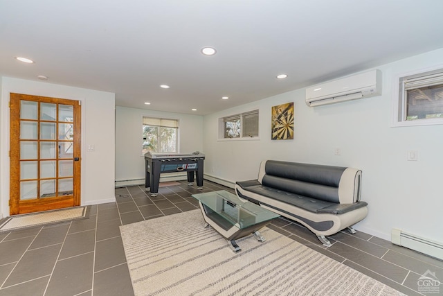 living room with dark tile patterned flooring, a wall unit AC, and a baseboard radiator