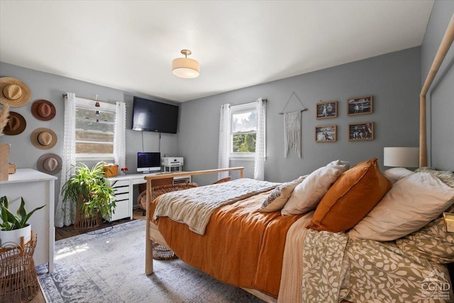 bedroom with light wood-type flooring