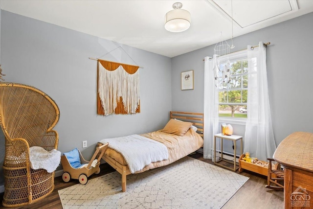 bedroom with dark wood-type flooring