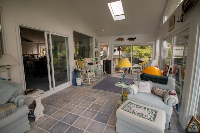 sunroom with vaulted ceiling with skylight