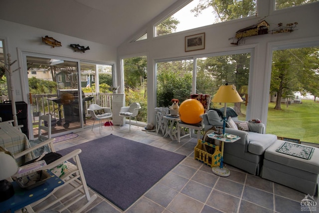 sunroom / solarium with lofted ceiling