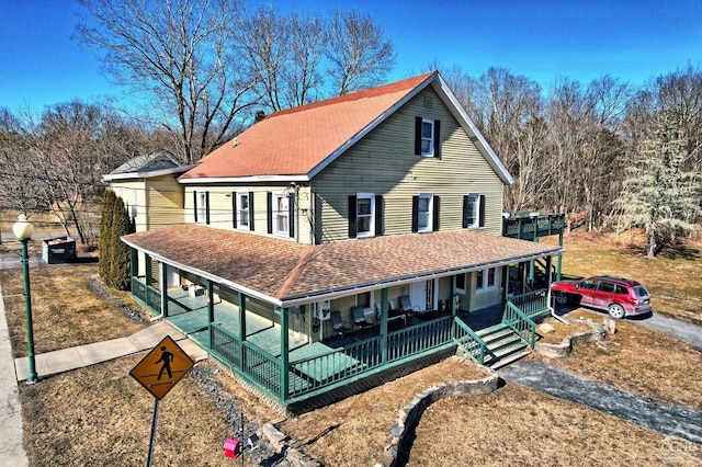 country-style home with covered porch