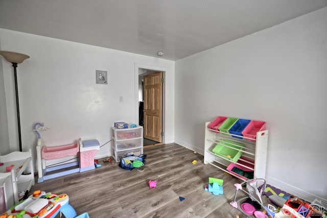 recreation room with hardwood / wood-style flooring