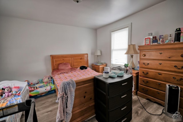 bedroom featuring hardwood / wood-style flooring