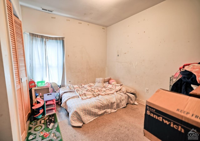 bedroom featuring carpet