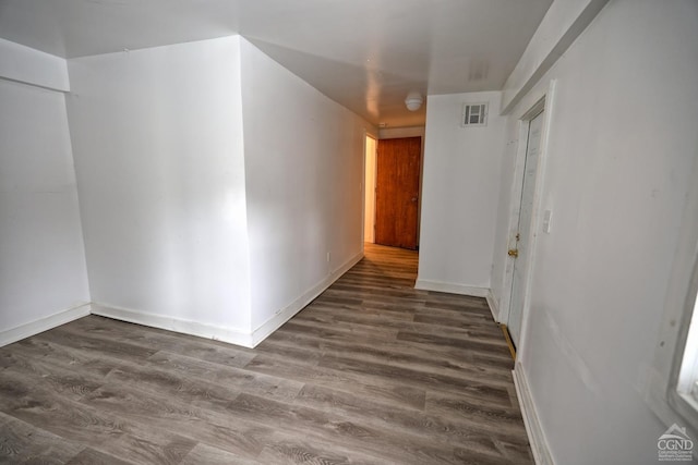 hall featuring dark wood-type flooring