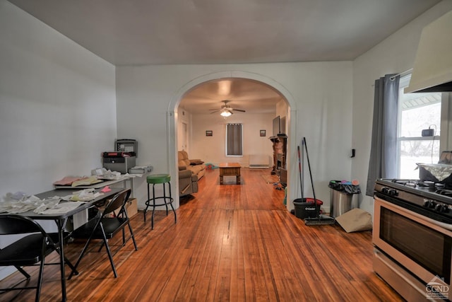 dining room featuring ceiling fan and hardwood / wood-style flooring