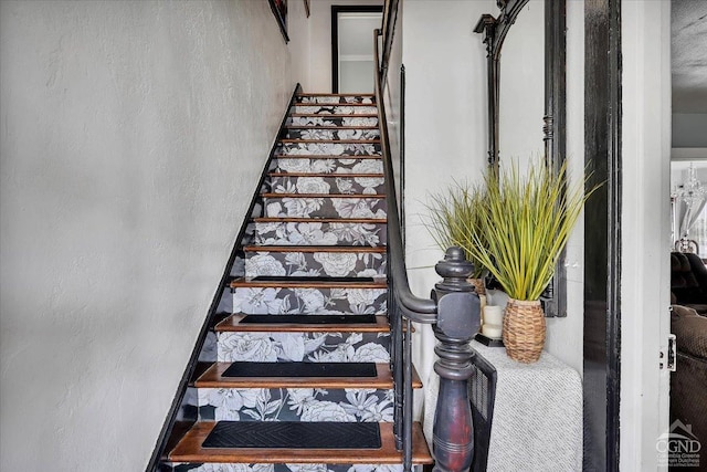 stairway with a textured wall