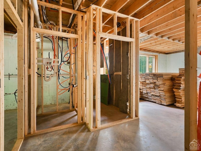 misc room with concrete flooring