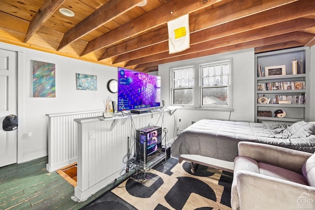 bedroom with hardwood / wood-style floors, beam ceiling, and wooden ceiling