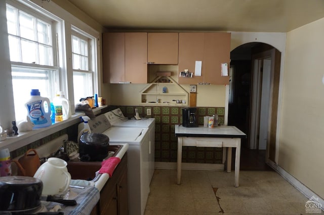 laundry room featuring separate washer and dryer