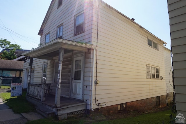 view of home's exterior with covered porch