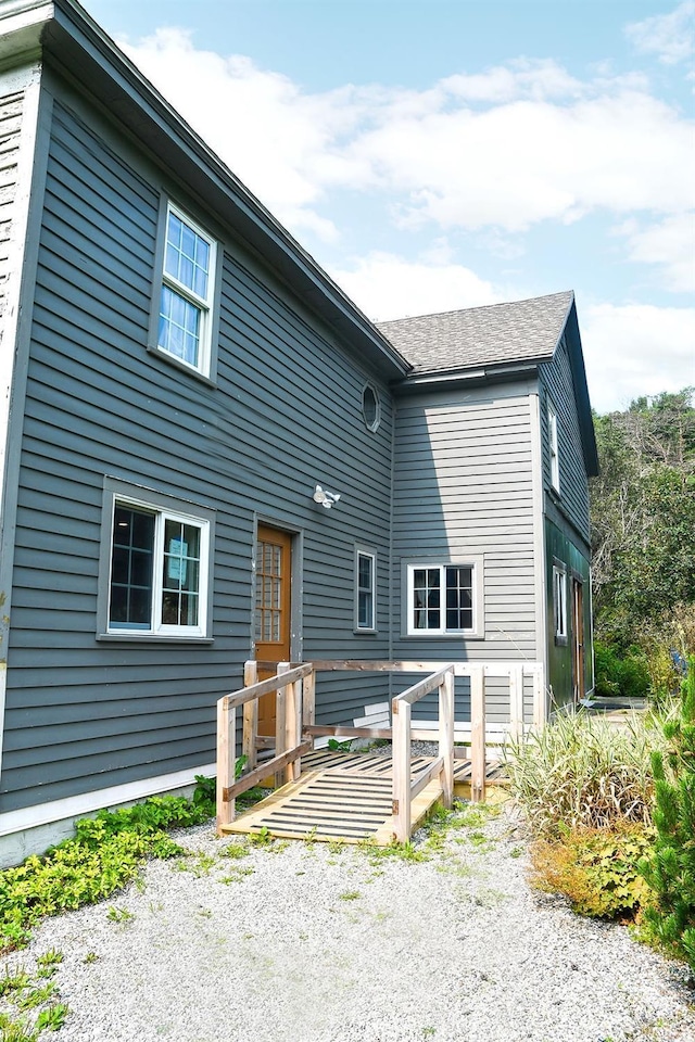 view of front of home with a wooden deck