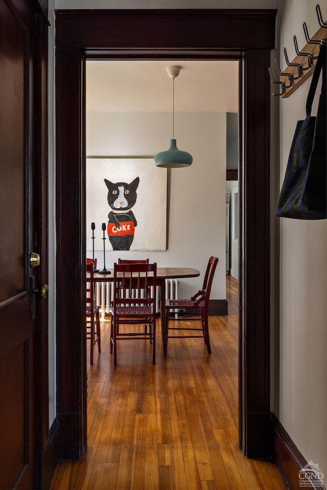 496 Clinton St, Hudson, NY 12534 - dining space with dark wood-style flooring and baseboards