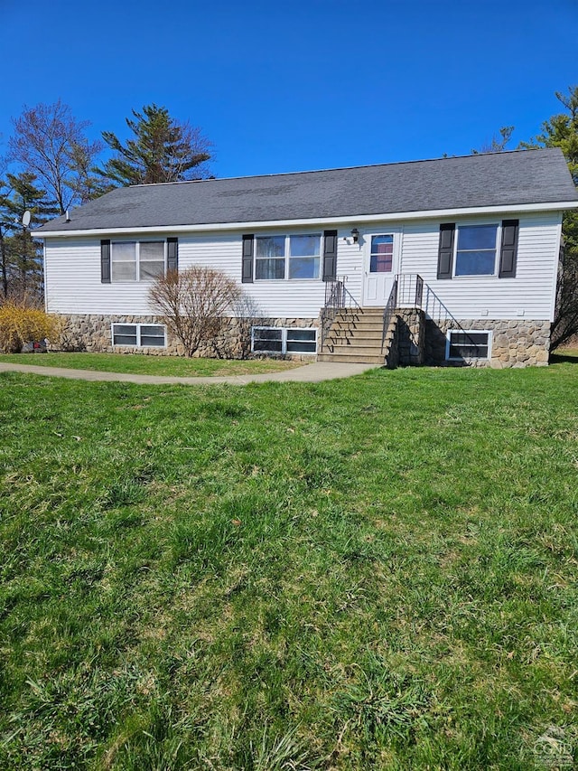 ranch-style home with a front yard