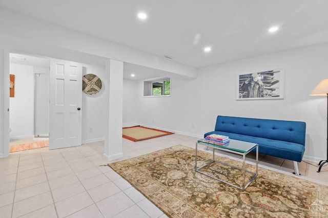 living area featuring light tile patterned floors