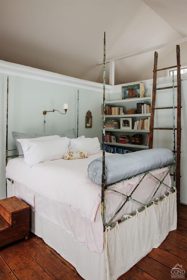 bedroom with hardwood / wood-style floors