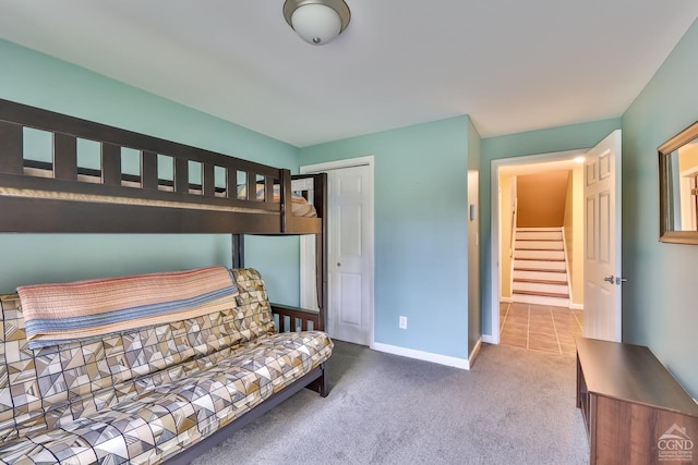 bedroom featuring a closet and carpet