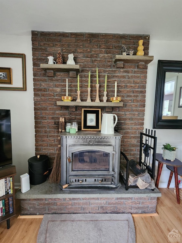 details featuring baseboards and wood finished floors