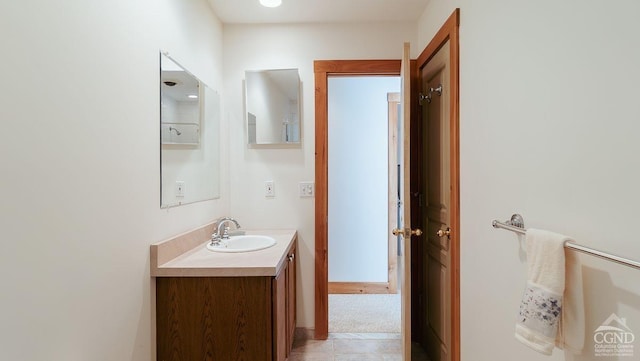 bathroom with vanity and tile patterned floors